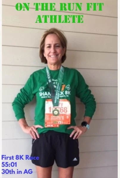 Mary with her race medal.