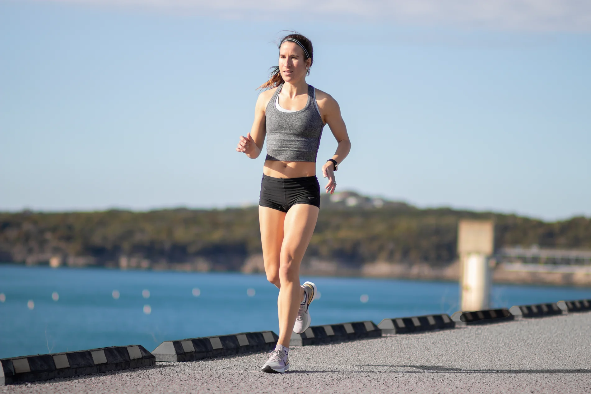 Lindsey running by the water.